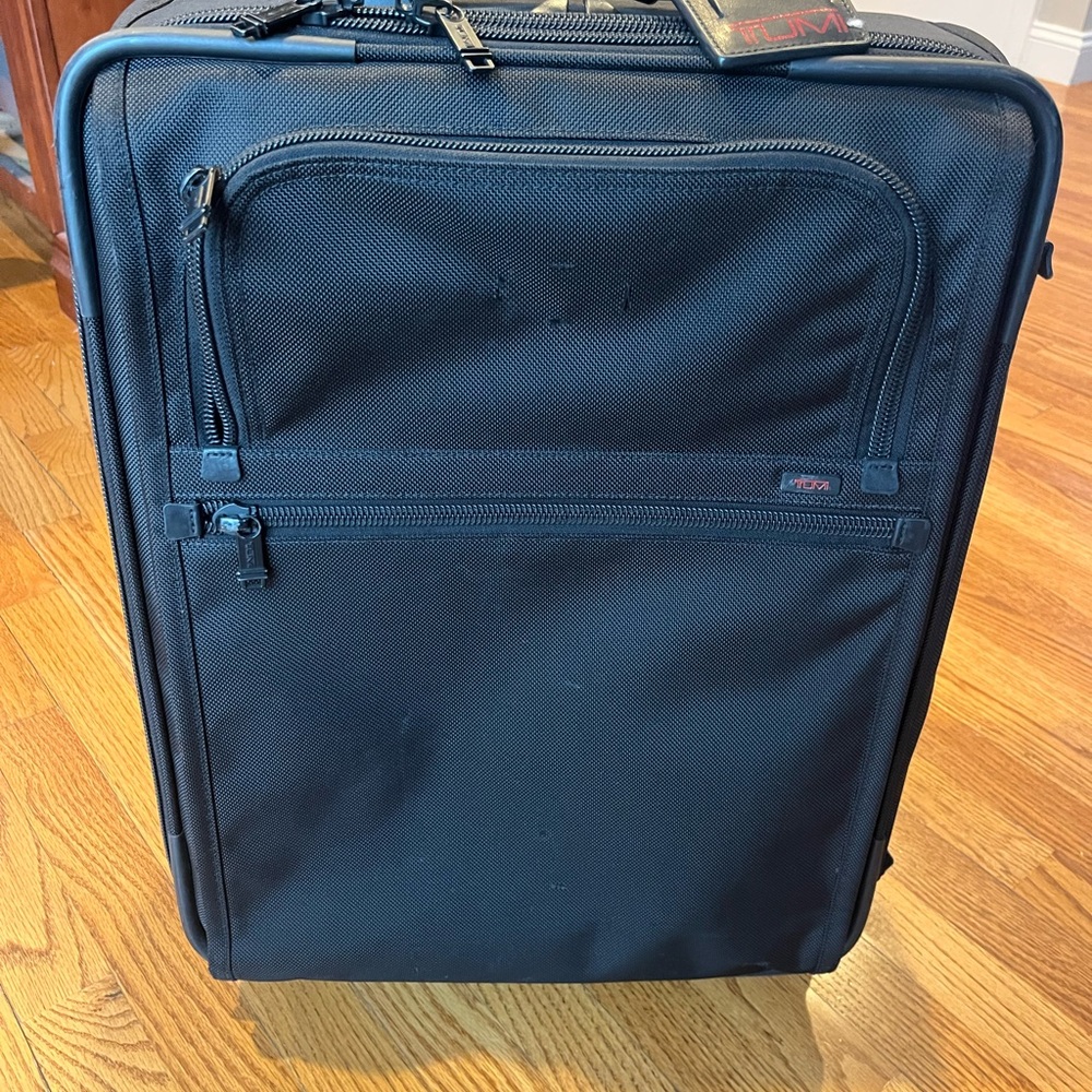 Tumi Black Nylon Upright Spinner Carry-On with Front Zip Pockets